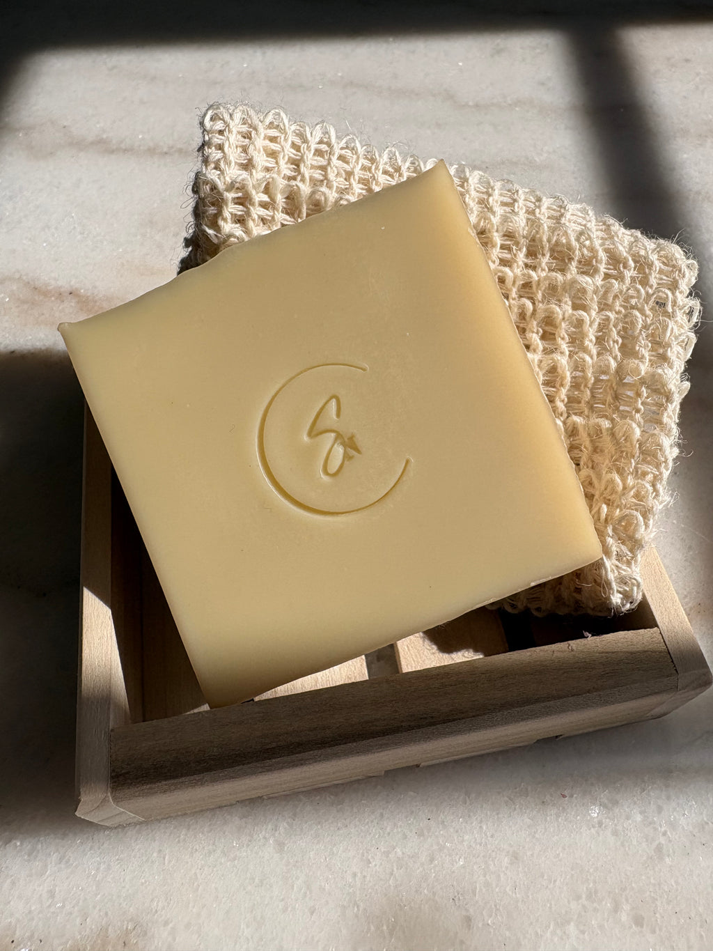 Handmade Chamomile beauty bar with sisal soap saver bag