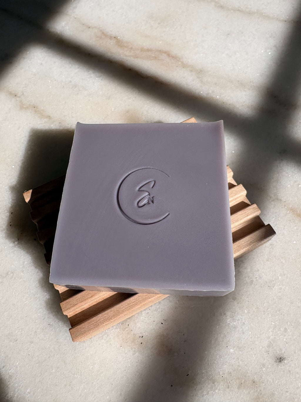 Natural herbal displayed on wooden soap dish