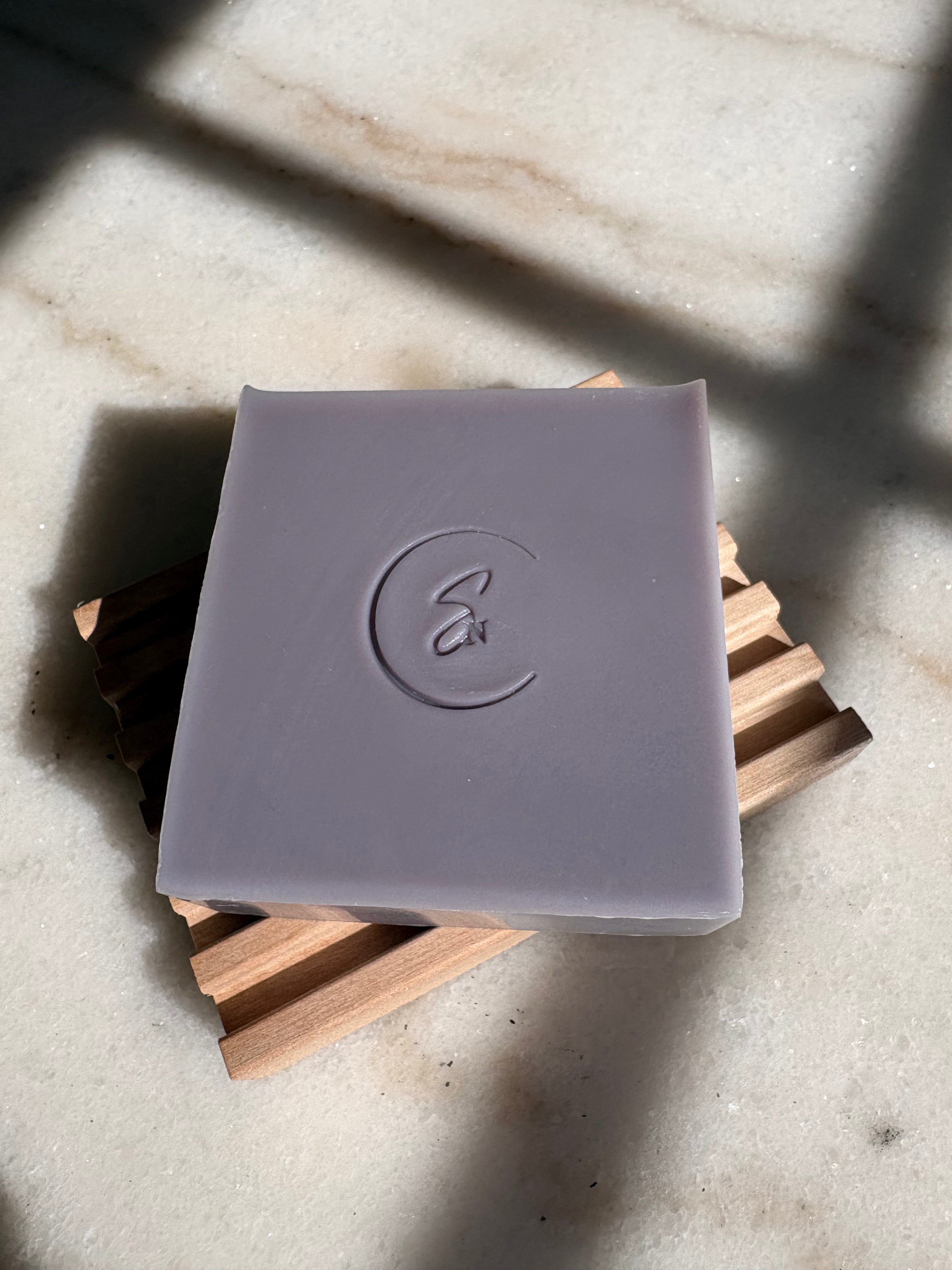 Natural herbal displayed on wooden soap dish