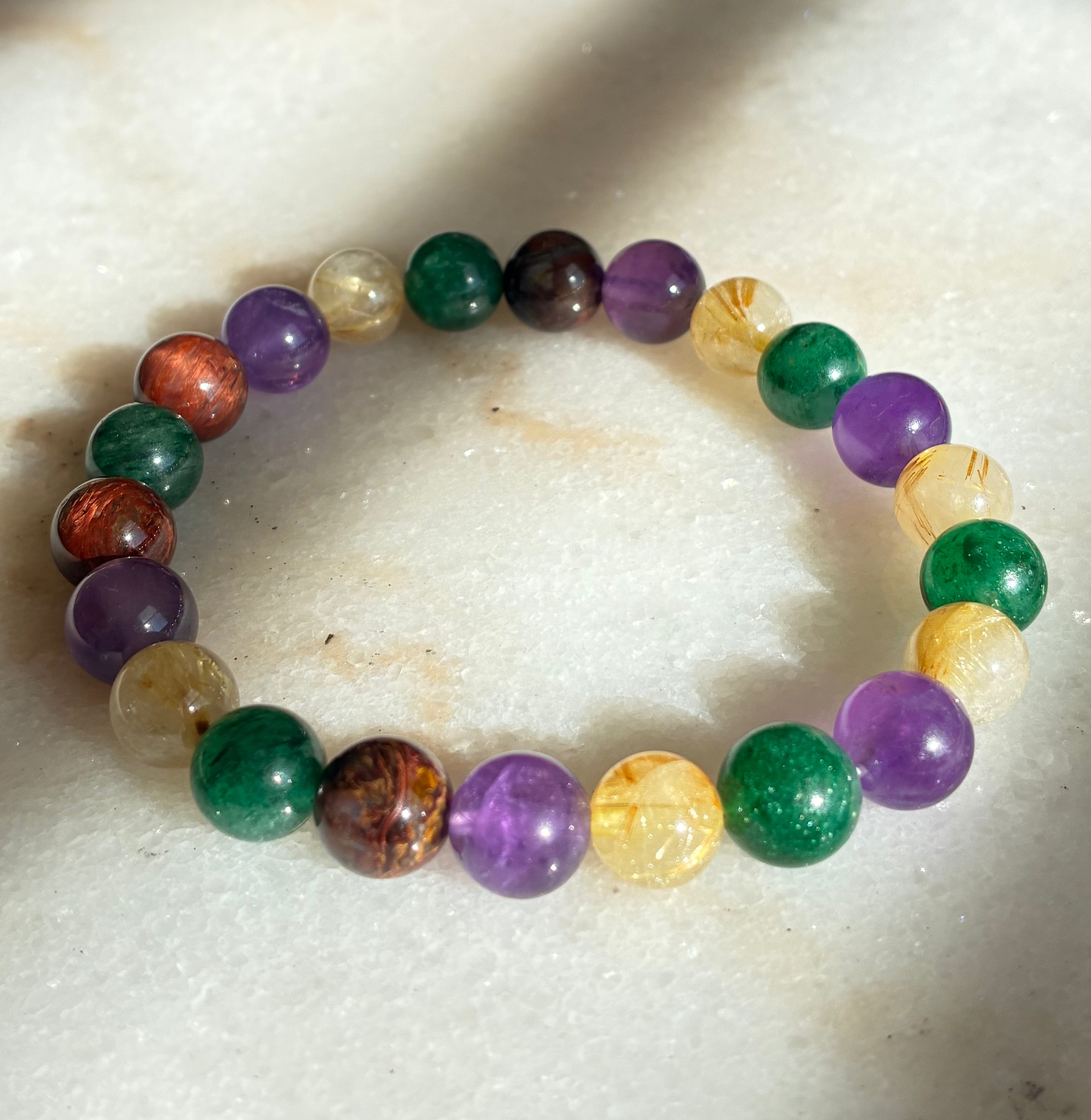 Paradisio (amethyst, reticulated quartz, green strawberry quartz, red pietersite)Bracelet - Natural Crystal
