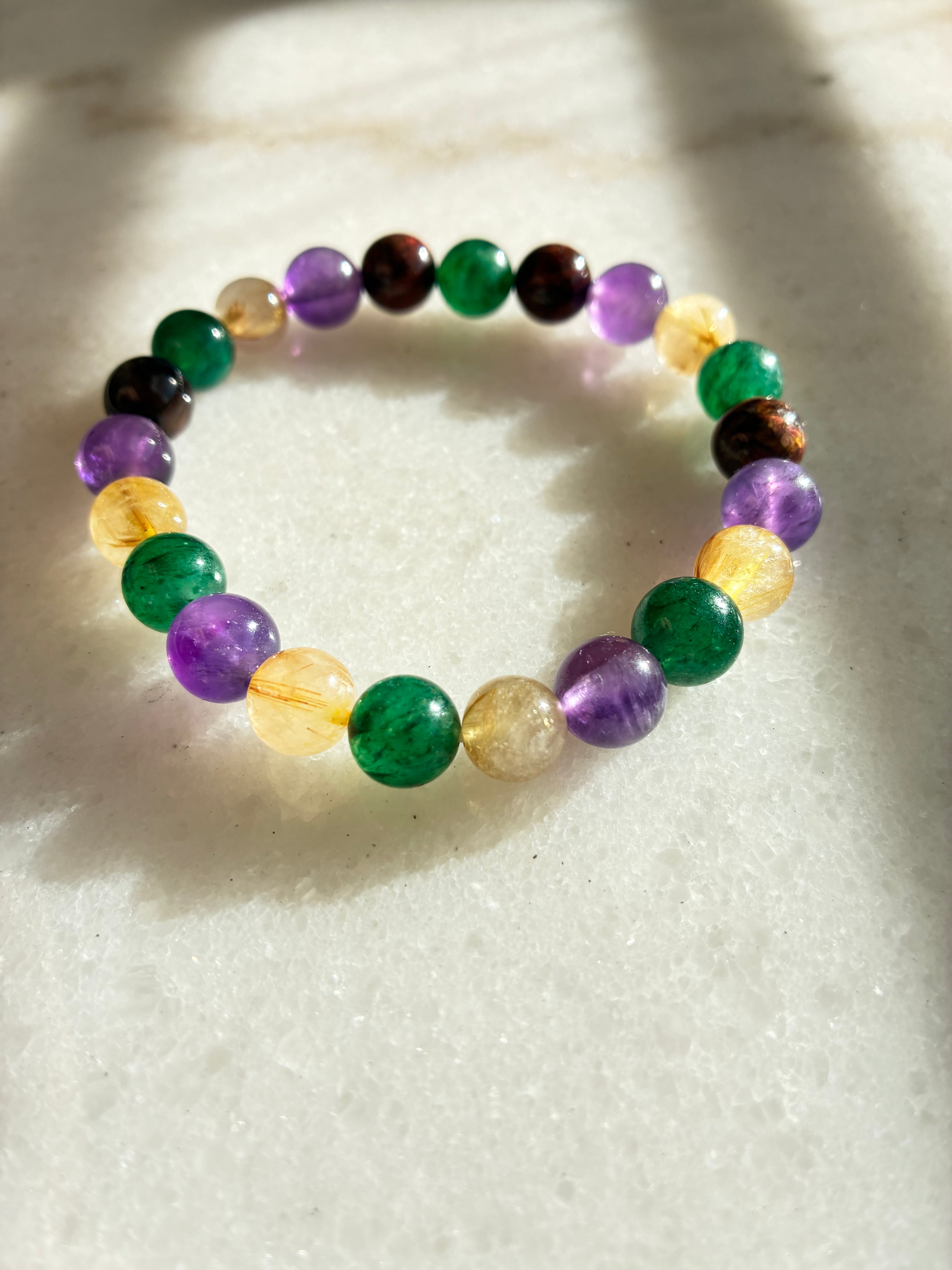 Paradisio (amethyst, reticulated quartz, green strawberry quartz, red pietersite)Bracelet - Natural Crystal