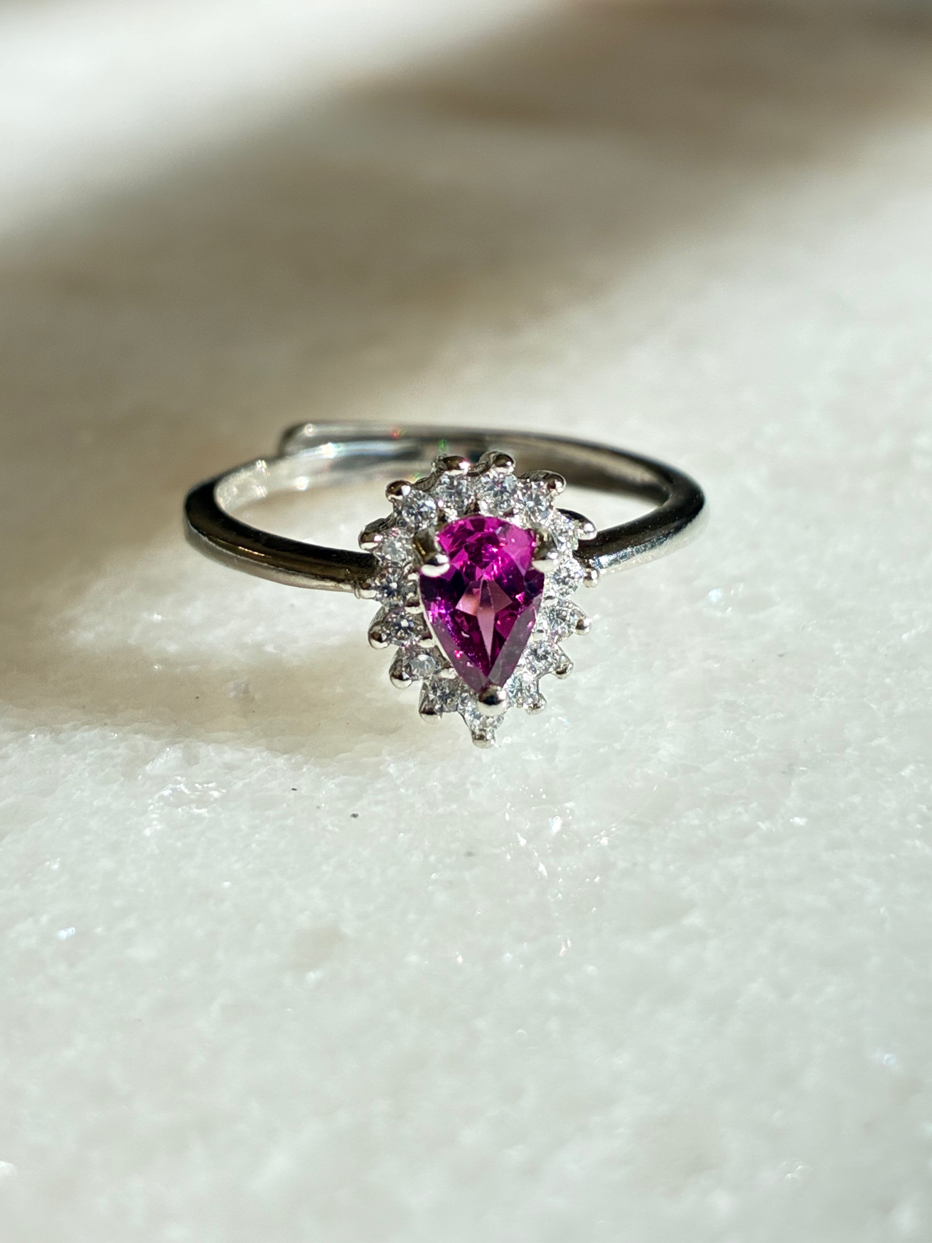 Silver ring with a pink gemstone 