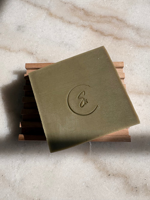 Handmade mugwort soap styled in minimalist setting