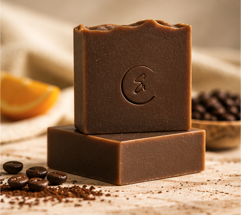 Sola Noor Spiced Orange and Coffee soap bars stacked to showcase their rich brown color and handcrafted appearance.